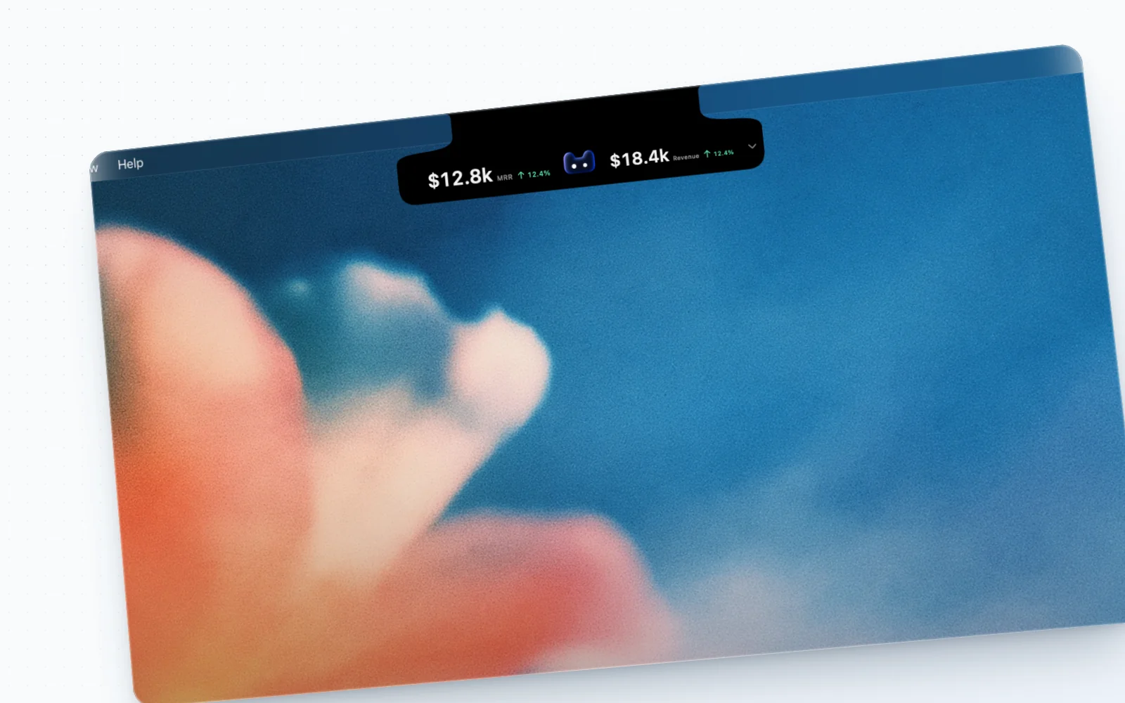 Compact revenue and MRR display just below the Mac camera notch